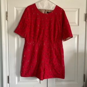 BCBGMaxAzria. Lace romper with pockets. Nude colored lining.  Color red berry.